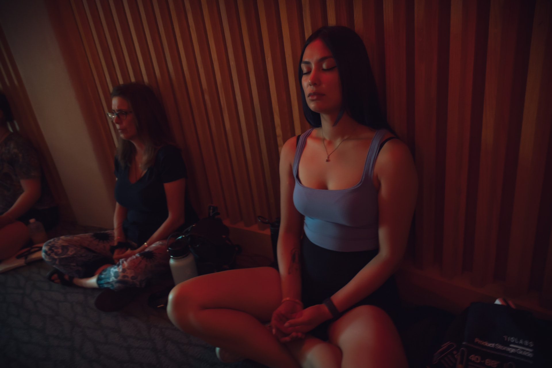 Attendees in a guided meditation during The SHIFT Experience